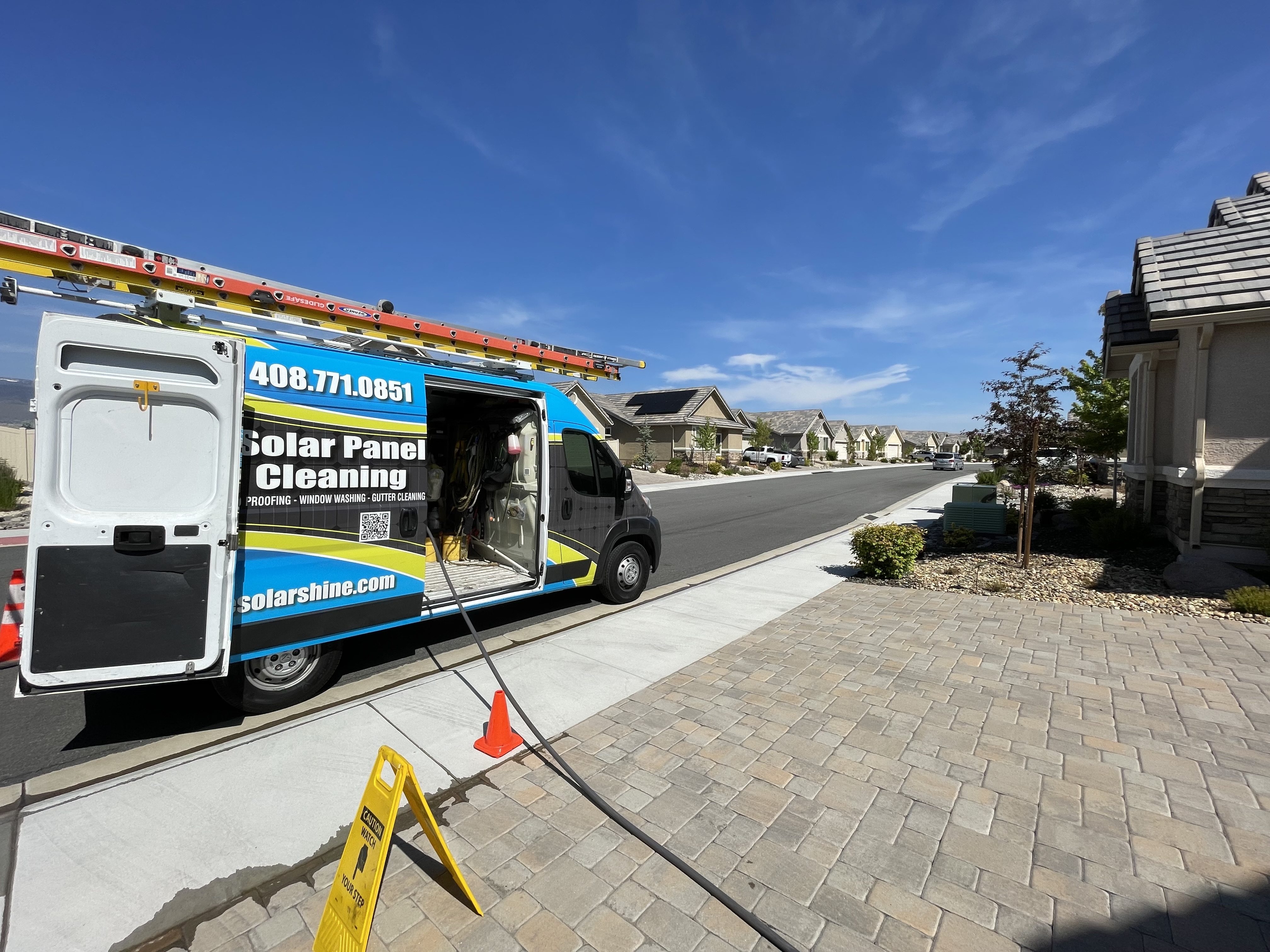 All One Solar Shine service van on a residential street